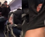 VIDEO - IMAGINI SOCANTE surprinse intr-un avion! Pasager tarat afara de la bordul unui zbor din cauza numarului mult prea mare de rezervari