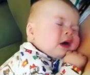 Reactia adorabila a unui bebelus dupa primul stranut - VIDEO