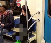 FOTO SOCANT! Aparitie incredibila la metrou. Calatorii au ramas cu gura cascata cand au vazut ce tine tanara pe picioare 