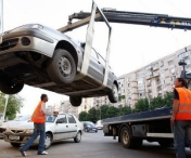 Vesti bune pentru soferi: Masinile parcate neregulamentar nu pot fi ridicate in baza unei decizii a consiliului local