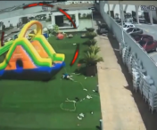 VIDEO SOCANT! Patru copii RANITI, dupa ce castelul gonflabil in care se jucau a fost luat de vant