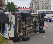 Masina de politie, cu rotile in sus la Timisoara. Accidentul a fost provocat de o soferita neatenta