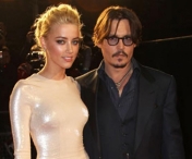 FOTO - Johnny Depp s-a logodit cu Amber Heard
