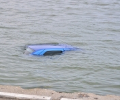 CUMPLIT! 5 MORTI, intre care doi copii, dupa ce o masina a cazut in apa la Cernavoda