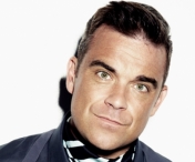Organizatorul show-ului Robbie Williams da vina pe o firma de catering pentru problemele de la concert