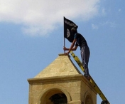 Steag al gruparii Stat Islamic, gasit la domiciliul autorului atacului comis intr-un tren din Germania