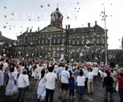 Mars alb la Amsterdam pentru victimele zborului MH17 - FOTO