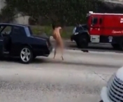 VIDEO SOCANT! Un sofer care a oprit in mijlocul drumului si s-a dezbracat complet a facut circ printre masini
