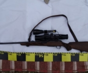 O arma si munitie, ridicate de politisti in urma unor perchezitii in Caras-Severin