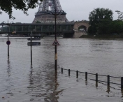 Parisul se pregateste de inundatii, dupa ce o ploaie torentiala a crescut nivelul fluviului Sena. Apa s-a revarsat pe strazi