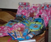 Rechizite pentru sute de copii nevoiasi din Timis si Arad
