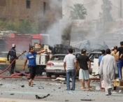 Cel putin 12 persoane au fost ucise si alte 30 au fost ranite intr-un triplu atentat sinucigas, in Irak