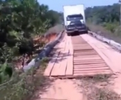 VIDEO - Soferul unui camion s-a incumentat sa treaca podul. Va imaginati ce se intampla?
