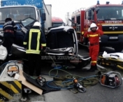 FOTO - ACCIDENT MORTAL: O femeie si-a pierdut viata in urma unei coliziuni dintre un Audi si un autocamion