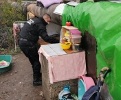 Actiune a politistilor locali in zona caii ferate de la Piata Timisoara 700 - colibe improvizate demolate si persoane fara adapost depistate
