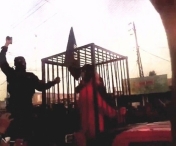 VIDEO SOCANT! O noua inregistrare Stat Islamic: Prizonierii sunt purtati in custi pe strazi
