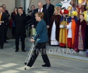 Angela Merkel, in carje, la prima aparitie publica de la accidentul de schi - FOTO