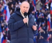 Cine este in spatele brandului care a produs geaca de 13.000 de euro pe care a purtat-o Vladimir Putin pe stadion