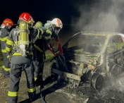 O mașina electrică a luat foc în mers pe un drum din satul Bencecu de Sus